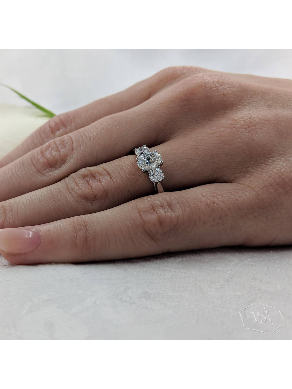 Royal Oval Diamond Three Stone Ring in Platinum