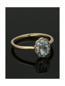 Blue Topaz & Diamond Oval Cluster Ring in 9ct Yellow Gold
