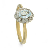 Blue Topaz & Diamond Oval Cluster Ring in 9ct Yellow Gold