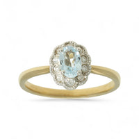 Blue Topaz & Diamond Oval Cluster Ring in 9ct Yellow Gold