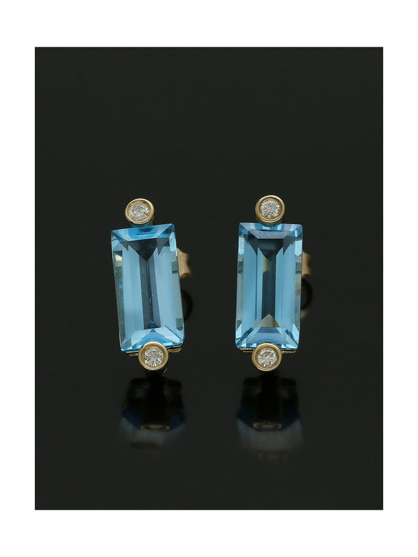 Diamond & Blue Topaz Baguette Stud Earrings in 9ct Yellow Gold
