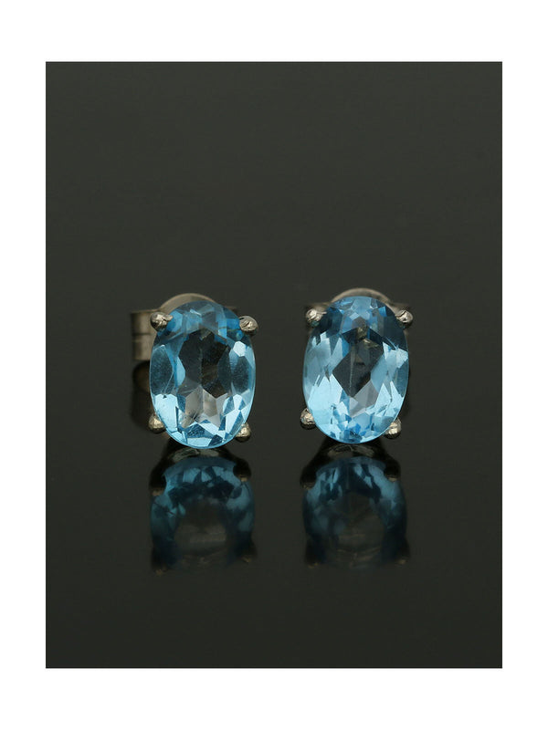 Swiss Blue Topaz Oval Stud Earrings in 9ct White Gold
