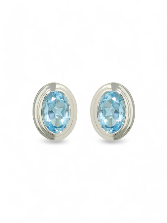 Blue Topaz Oval Cut Single Stone Earrings in 9ct White Gold