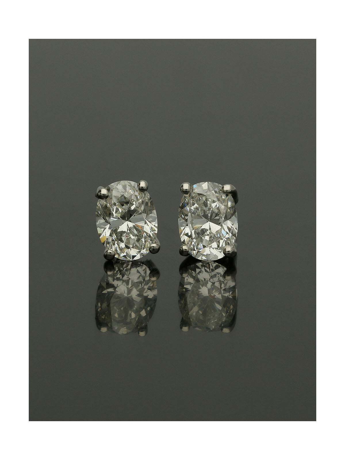 Pre Owned Diamond Oval Cut Single Stone Stud Earrings in Platinum