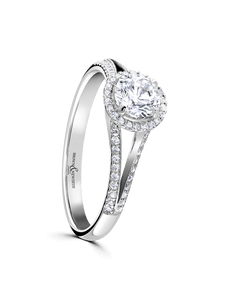 Diamond Halo Engagement Ring 0.50ct Certificated Round Brilliant Cut in Platinum with Diamond Shoulders