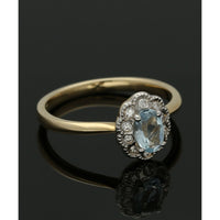 Blue Topaz & Diamond Oval Cluster Ring in 9ct Yellow Gold