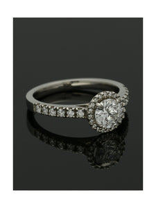 Diamond Halo Engagement Ring 0.70ct Certificated Round Brilliant Cut in Platinum with Diamond Shoulders
