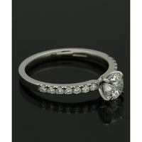 Diamond Solitaire Engagement Ring 0.70ct Round Brilliant Cut in Platinum with Diamond Shoulders