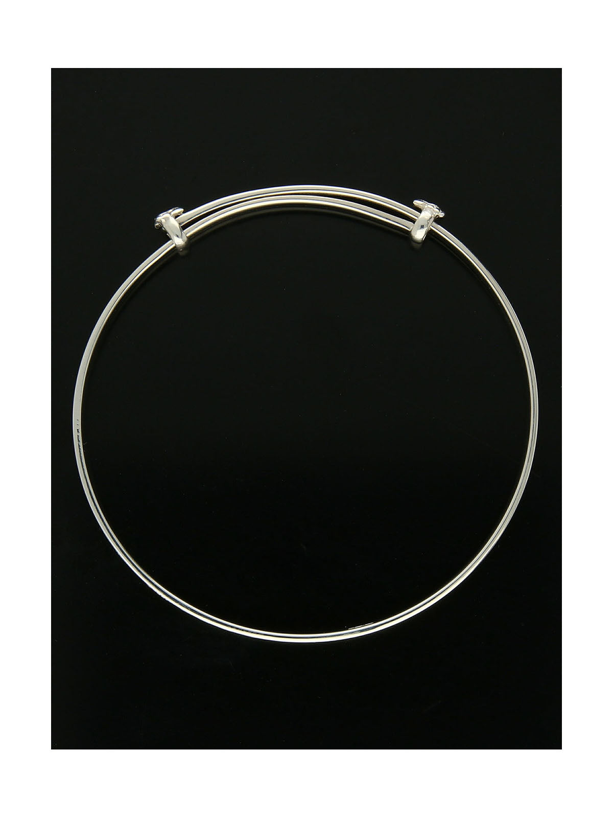 Maids Wave Engraved Bangle in Silver