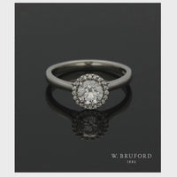 Diamond Halo Engagement Ring 0.70ct Certificated Round Brilliant Cut in Platinum