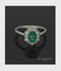 Emerald & Diamond Cluster Ring Oval Cut in 18ct White Gold