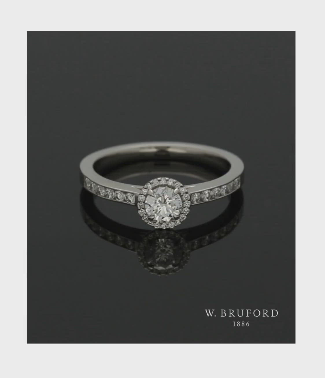 Diamond Halo Engagement Ring 0.33ct Certificated Round Brilliant Cut in Platinum with Diamond Shoulders