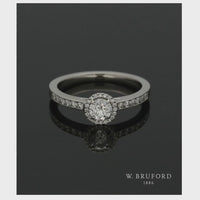 Diamond Halo Engagement Ring 0.33ct Certificated Round Brilliant Cut in Platinum with Diamond Shoulders